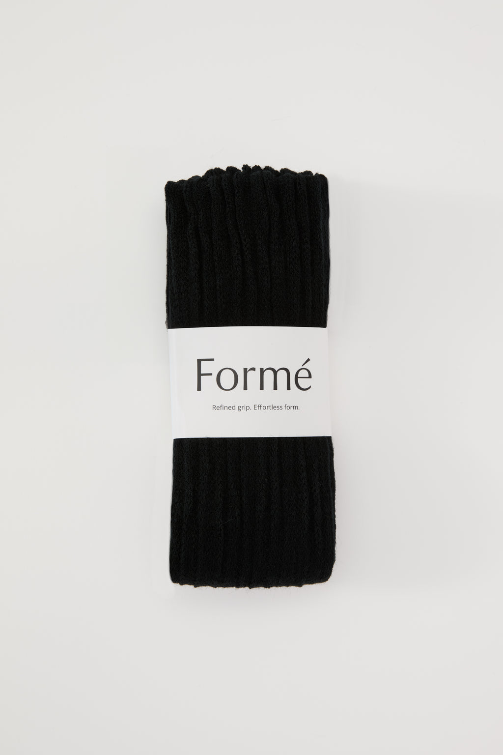 The Studio Grip Warmer in Onyx, folded with the Formé band
