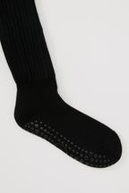 The Studio Grip Warmer in Onyx, ankle and grip sole detail