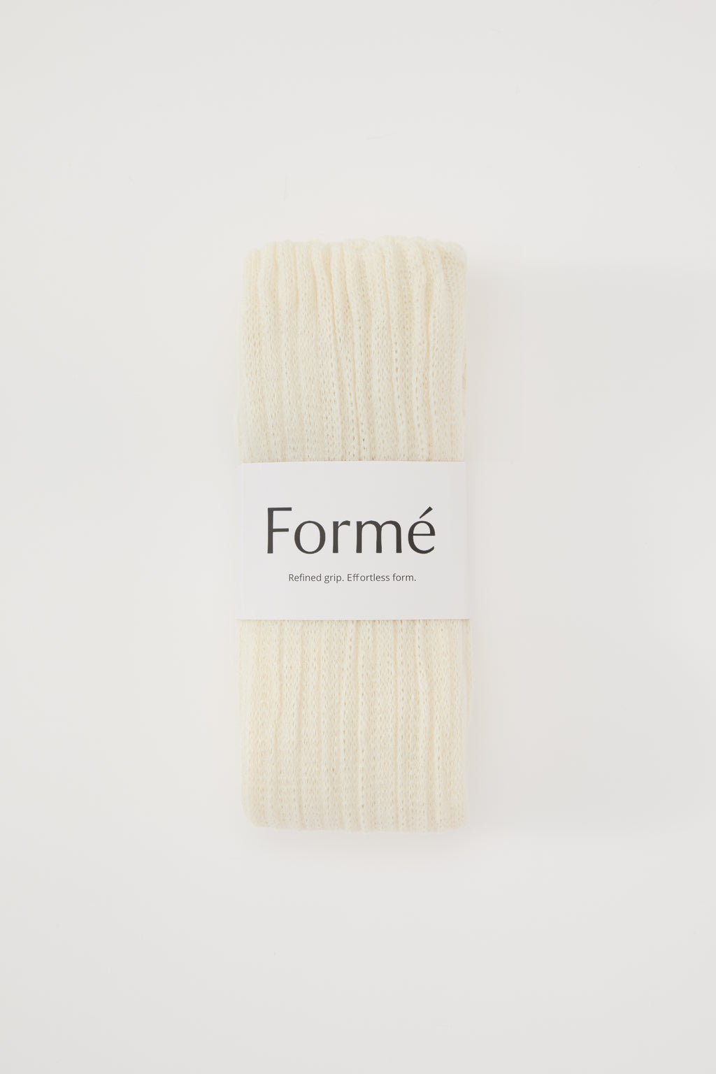 The Studio Grip Warmer in Ivory, folded with the Formé band