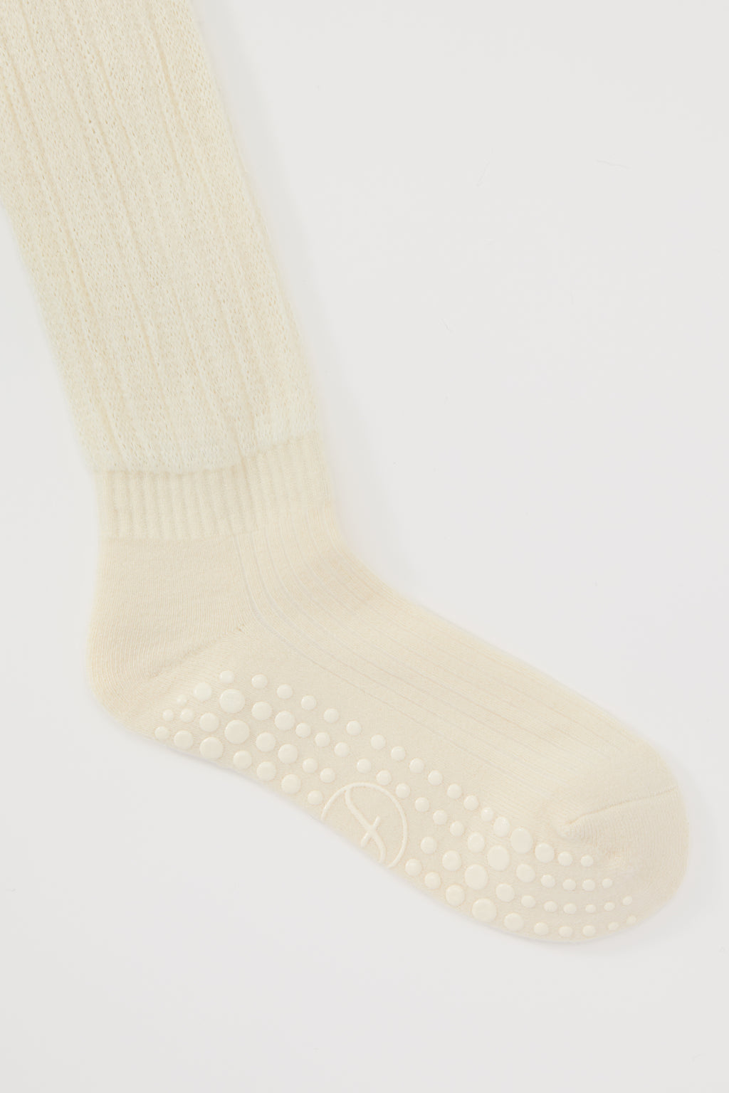 The Studio Grip Warmer in Ivory, ankle and grip sole detail