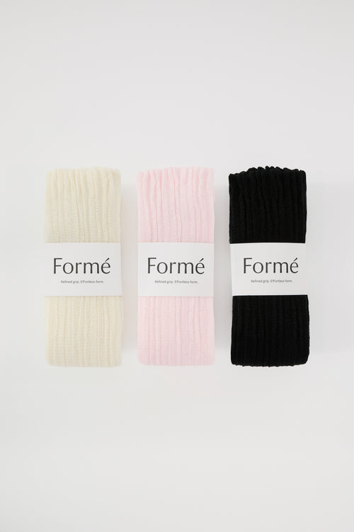 The Complete Set, three pairs in Ivory, Blush, and Onyx folded with Formé bands