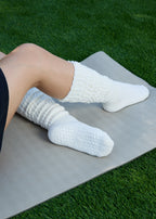 The Studio Grip Warmer in Ivory, grip sole detail, side view