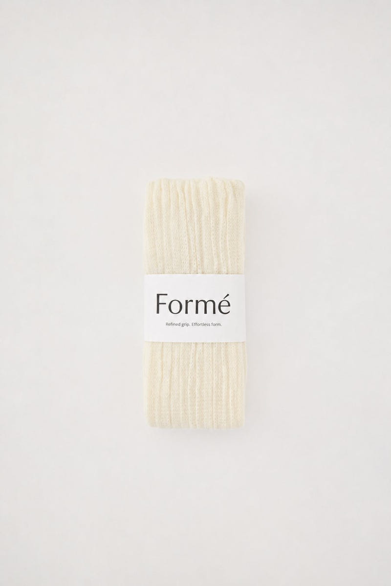 One Studio Grip Warmer pair, folded with the Formé band